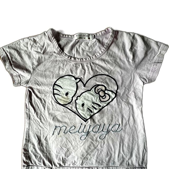 T-shirt featuring a Hello Kitty graphic